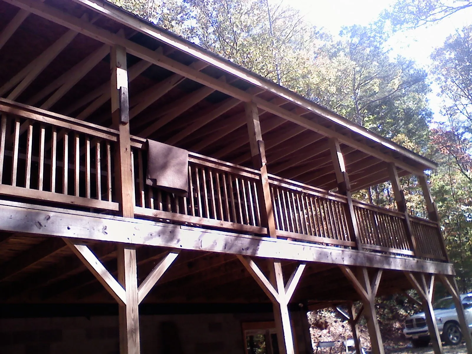 Timber framing under a new elevated porch and deck — Roof Leak Repair in North Collins by Roofing Brothers